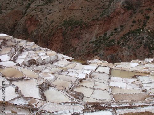 SALINERAS DE MARAS, SALINAR DONDE SACAN LA SAL ROSADA DE LOS INCAS EN MARAS - URUBAMBA - CUSCO - PERÚ photo