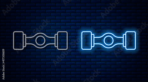 Glowing neon line Chassis car icon isolated on brick wall background. Vector.