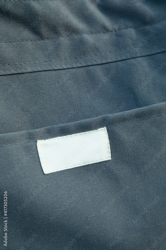 Stylish eco bag on whole background, close up Stylish eco bag on whole background, close up