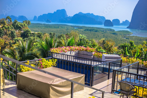 The natural background of the morning light rising in the middle of the sea and surrounded by mountains  cool breezes  the beauty of the ecology of the tourist attractions.