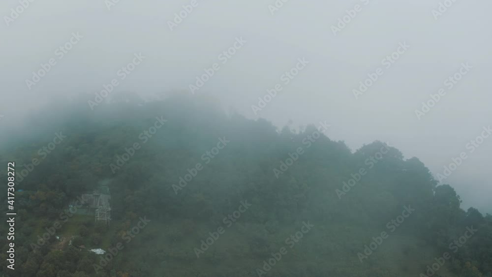 Drone Aerial View of Thick Fog Above Forest of Scenic Hobbit Mountain, Guatemala Drone Aerial View of Thick Fog Above Forest of Scenic Hobbit Mountain, Guatemala