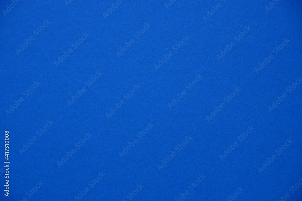 Paper, cardboard background. High resolution paper texture. Colored Blue background. Paper, cardboard background. High resolution paper texture. Colored Blue background.