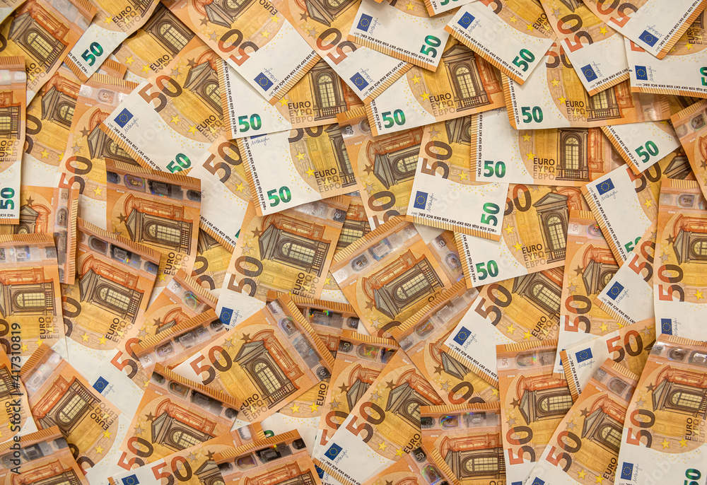 Business, finance, wealth 50 euro bills as background