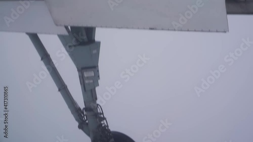 Airplane landing gear down deploy flying in dense fog zero visibility instrument flight approach for landing