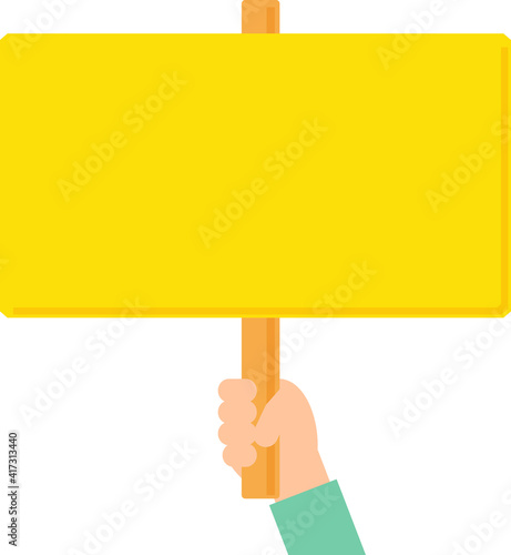 黄色い手持ち看板を持つ手