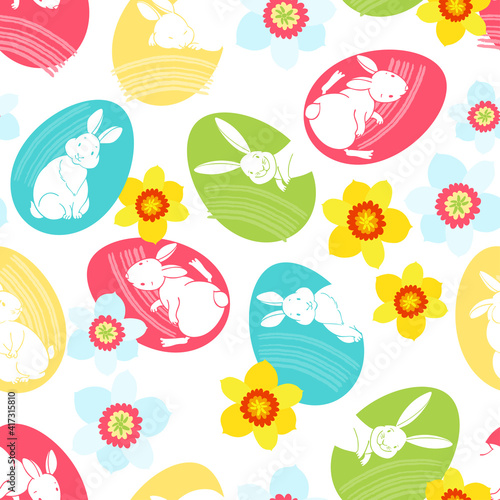 Easter background. Vector. Seamless patternwith colorful Easter eggs , cute rabbits and daffodils on white. Perfect for design templates, wallpaper, wrapping, fabric and textile.