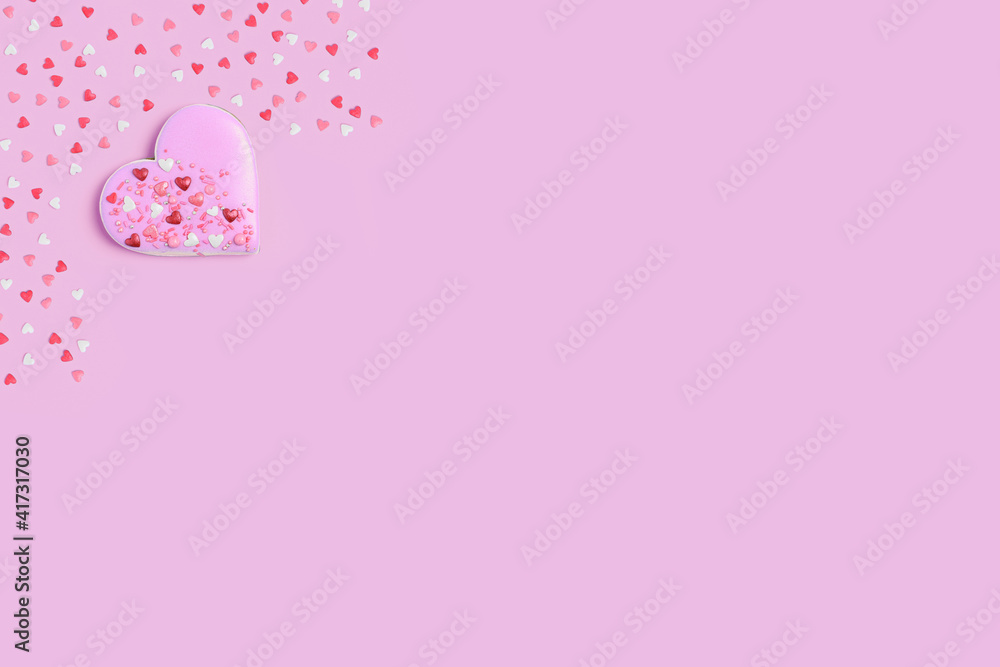 . Heart shaped cookies or gingerbread on pink pastel background with blank space for text. The concept before the wedding day, Valentine's day, women's day. Blank for a greeting card.