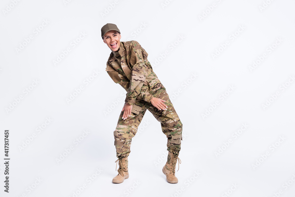 Full body portrait of positive pretty lady crossed hands have fun partying isolated on white color background Full body portrait of positive pretty lady crossed hands have fun partying isolated on white color background