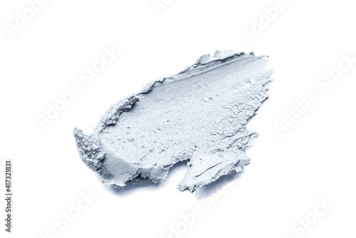 Smear of cosmetic clay isolated on a white background.