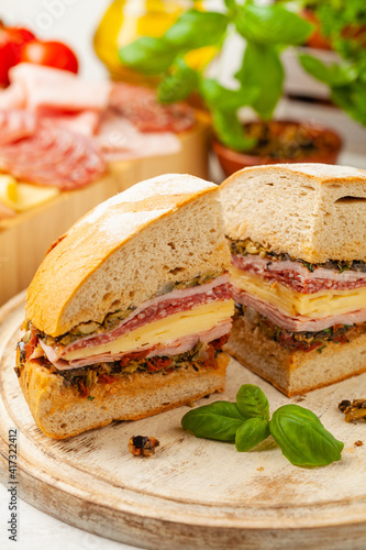 Wallpaper Mural Muffuletta. Sandwich with cheese, ham and olive paste. A traditional recipe in New Orleans. Torontodigital.ca