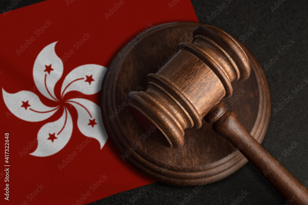 Judge gavel and flag of Hong Kong. Law and justice in Chile. Violation of rights and freedoms
