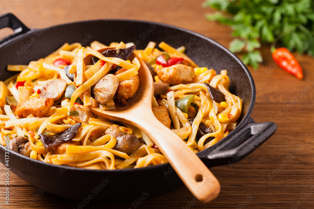 Indonesian pasta with chicken, pieces of bamboo and mushrooms. Indonesian pasta with chicken, pieces of bamboo and mushrooms.