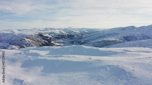 Distant cast away tourist lost at Bergsdalen mountain peak Hamlagro Norway photo