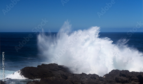 Gran Canaria, north coast, area around Punta Sardina cape, powerful foamy ocean waves breaking along the shore 