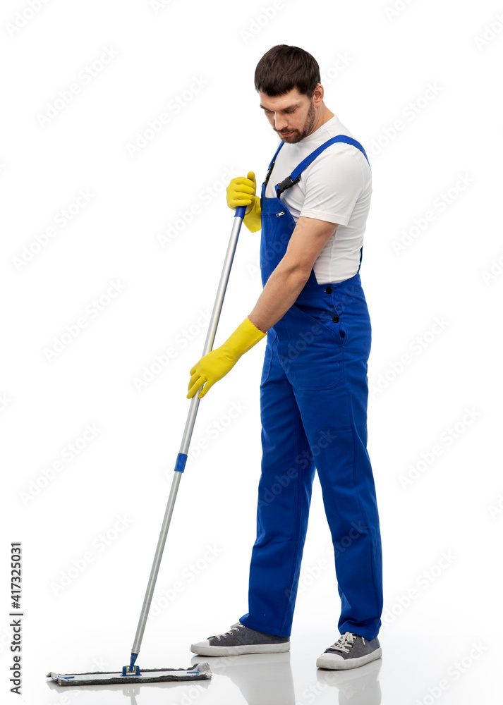 profession, service and people - male worker or cleaner in overal and gloves cleaning floor with mop over white background profession, service and people - male worker or cleaner in overal and gloves cleaning floor with mop over white background