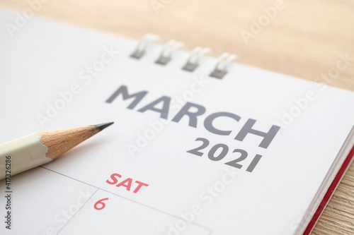 March month on 2021 calendar page with pencil business planning appointment meeting concept