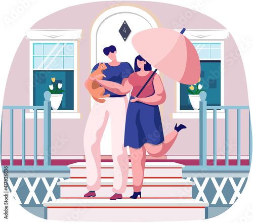 Couple pet owners holding ginger cat on hands going down steps. Happy people walking with kitten and umbrella outdoor. Man and woman are having leisure spend time with domestic animal cute kitty