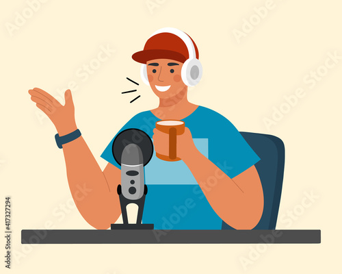 Young smiling man sitting with headphones and microphone recording audio podcast. Concept of radio broadcasting. Flat vector illustration.