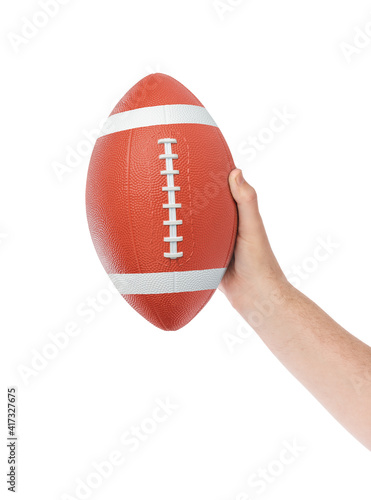 Hand and rugby ball
