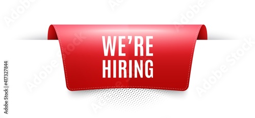 We're hiring symbol. Red ribbon label tag. Recruitment agency sign. Hire employees symbol. Infographics price tag banner. Hiring badge shape. Website ribbon label banner. Vector