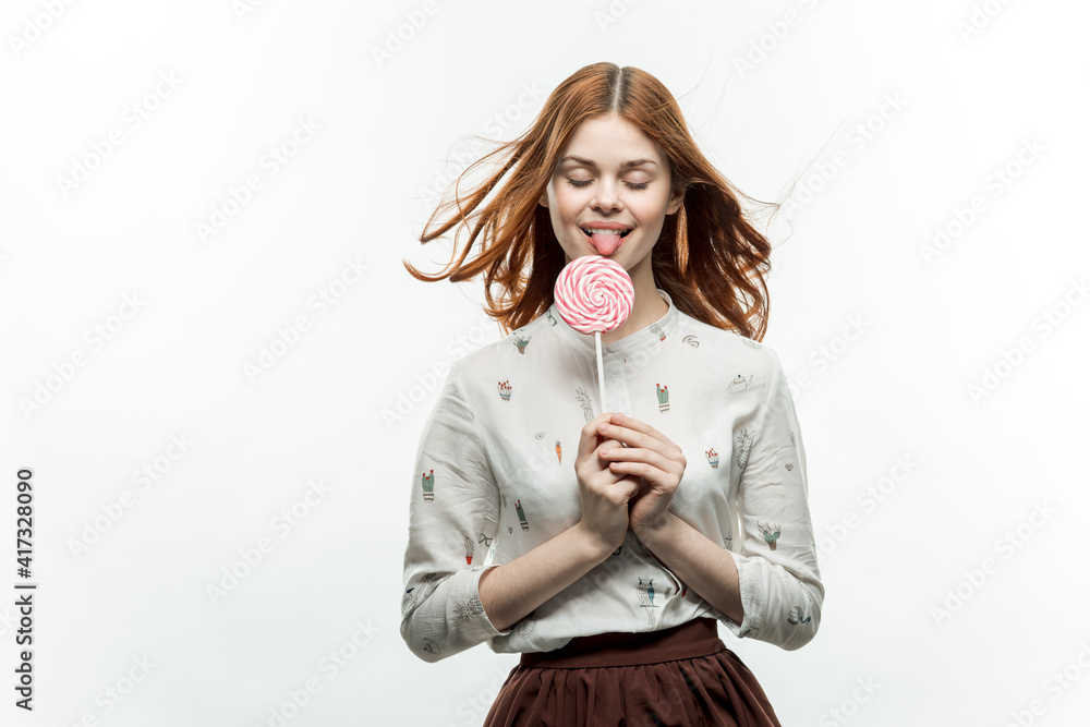 cute red haired woman round lollipop fun emotions light background cute red haired woman round lollipop fun emotions light background