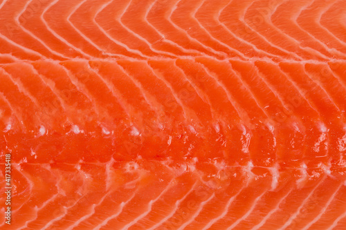 Background of fish flesh of salmon fillet close-up