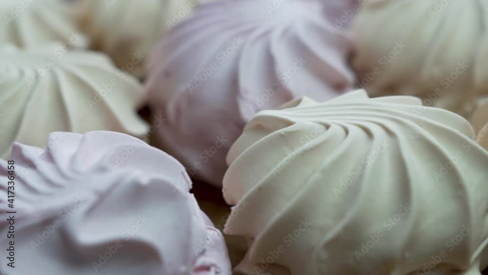 Delicious Marshmallows Close-up, Isolated, Rotation. Background of Sweets, Marshmallows. Yummy. Delicious Marshmallows Close-up, Isolated, Rotation. Background of Sweets, Marshmallows. Yummy.