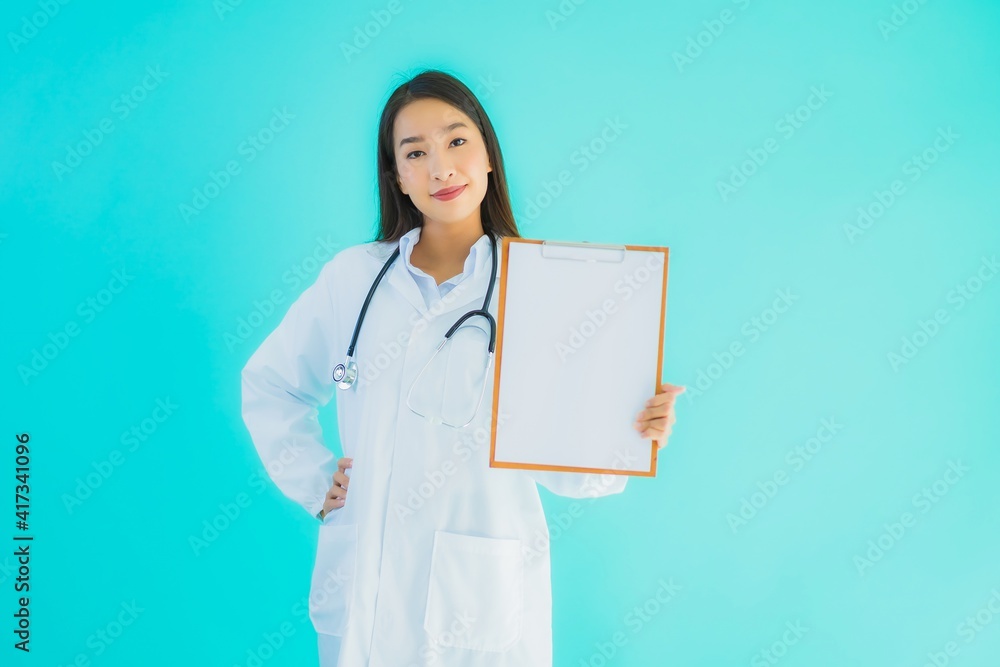 Portrait beautiful young asian doctor woman with empty card board Portrait beautiful young asian doctor woman with empty card board