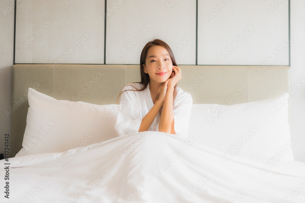 Portrait beautiful young asian woman relax happy smile in bedroom Portrait beautiful young asian woman relax happy smile in bedroom