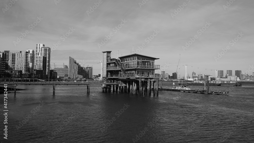 Naklejka premium Greenwich Yacht Club on river Thames east London black and white 