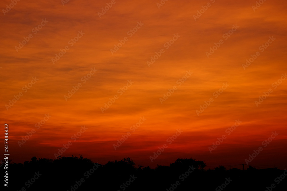 beautiful colorful orange cloud in sky at sunset