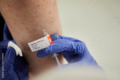 Wallpaper Mural Close-up of coronavirus vaccination Torontodigital.ca