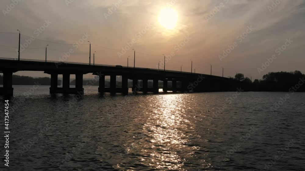Beautiful sunset sun over the bridge with city Beautiful sunset sun over the bridge with city
