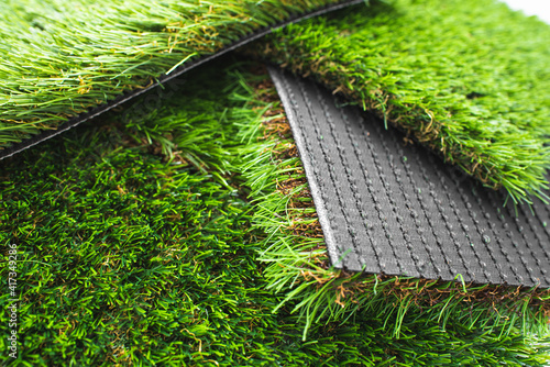 Detail of types of artificial grass in a sample book. photo