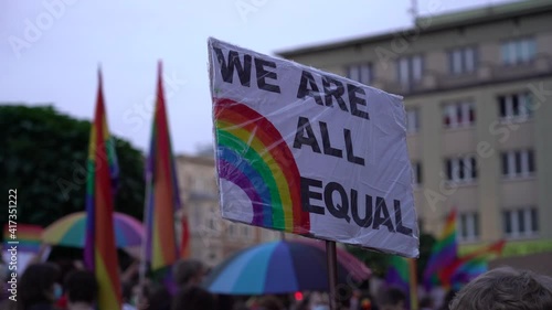 LGBT equality march. Fight for LGBTQ+ rights. Rainbow flags, banners and masks. Struggle for LGBT rights during coronavirus pandemic.