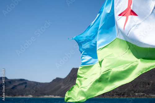 Djibouti flag in Bay of Ghoubet in East Africa photo