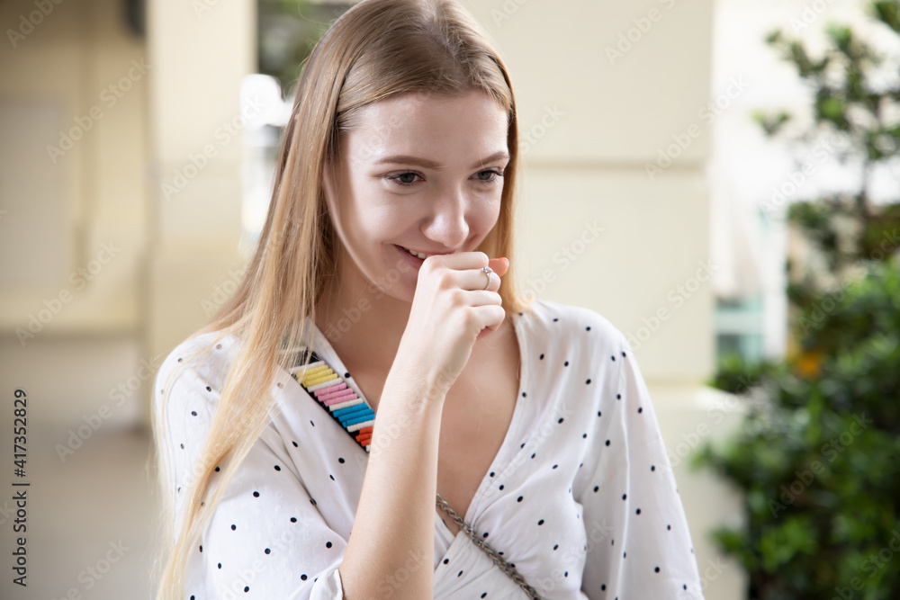 happy laughing woman with blonde hair, portrait of positive confident happy smiling white woman smiles in urban summer environment, young adult caucasian woman model happy laughing woman with blonde hair, portrait of positive confident happy smiling white woman smiles in urban summer environment, young adult caucasian woman model
