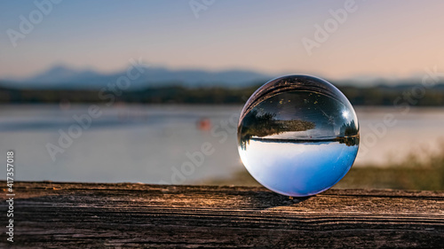 Crystal ball alpine summer landscape shot at the famous Waginger See, Waging, Bavaria, Germany © Martin Erdniss