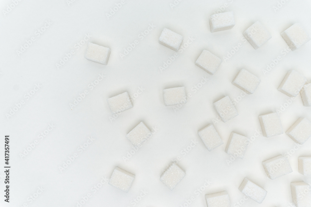 sugar cubes on a light background Glucose ingredient sugar cubes on a light background Glucose ingredient
