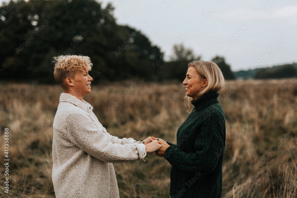 Happy female couple together Happy female couple together