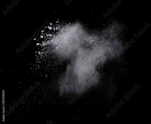 Abstract design of white powder cloud splash isolated on black background