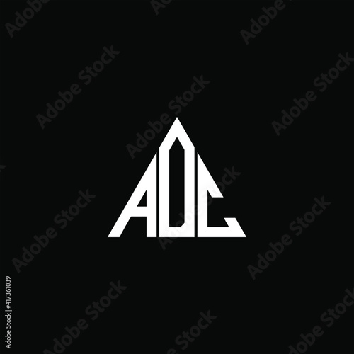 A D C letter logo abstract design on black color background. adc alphabet photo