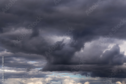 Epic Dramatic Storm sky, dark grey violet thunderstorm clouds background texture, tornado 