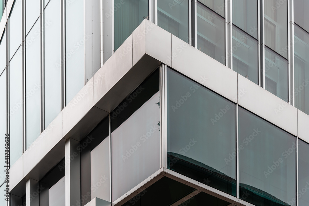 Glass facade. Modern architecture building. Technology, business amd finance concept Glass facade. Modern architecture building. Technology, business amd finance concept