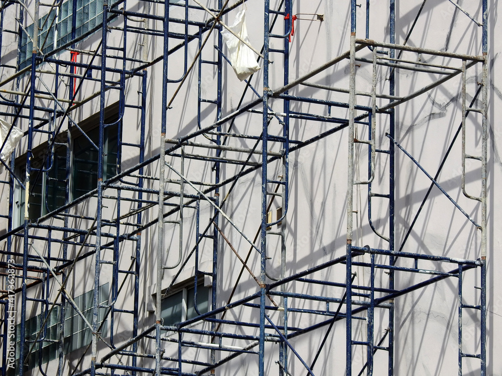 Scaffolding beside the building in the construction site