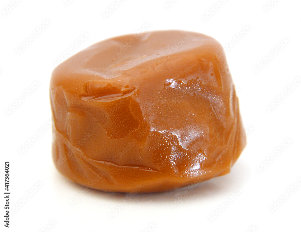 Pieces of Caramel Candy Isolated on a White Background Pieces of Caramel Candy Isolated on a White Background