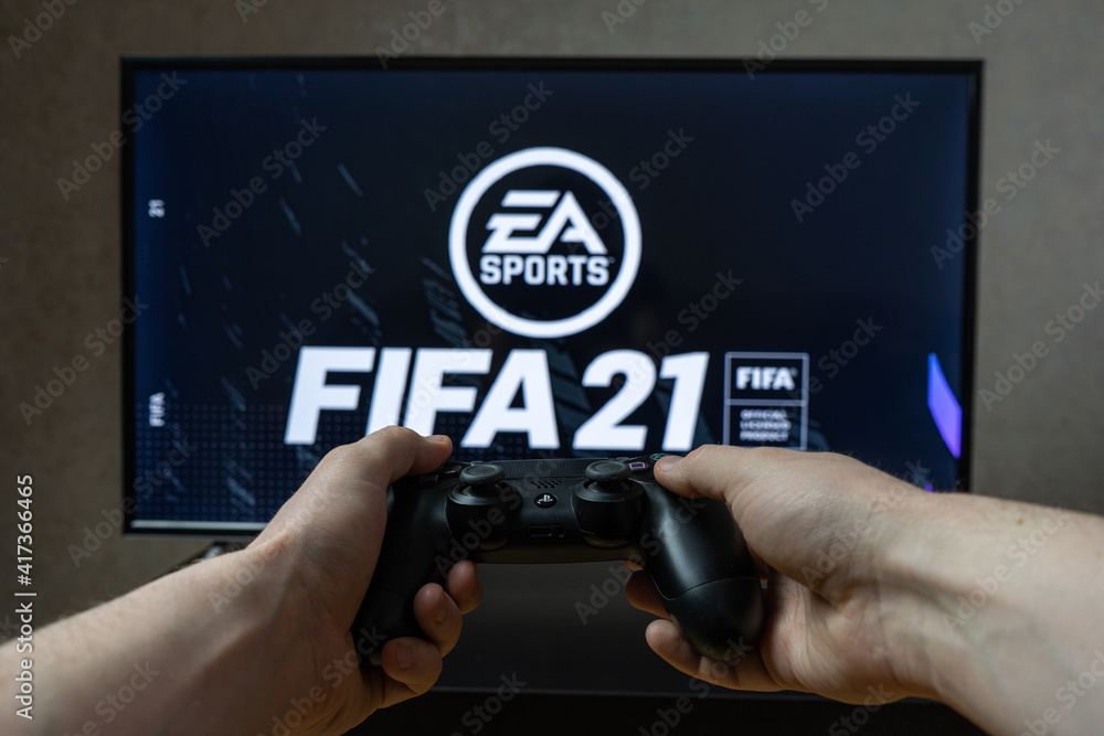Fotka „Point of view video gaming. Playing video game on Playstation. EA  sports Fifa football game “ ze služby Stock | Adobe Stock