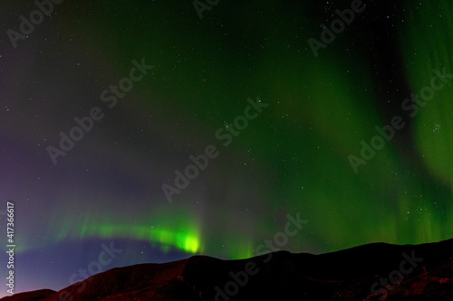 Northern lights, aurora, at the latitude of the far north © Vladimir
