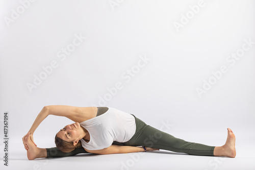 (34-104)Revolved Seated Angle Pose (Parivrtta Upavistha Konasana Variation) Yoga Posture (Asana)