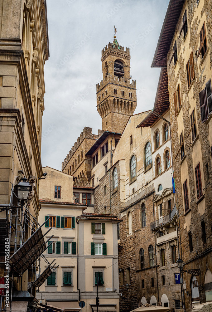 Ancient Florence cityscape and Palazzo Vecchio. View from the Piazza Del Grano street.  Florence , Tuscany,  Italy
